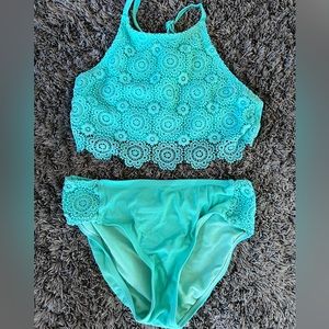 Like new mint green lace bikini. Cross cross back. No stains. Both Size 12